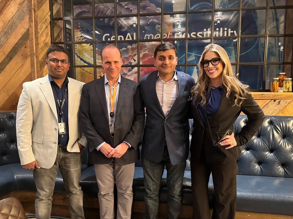 Amy Alba with panelists at AWS re:Invent.